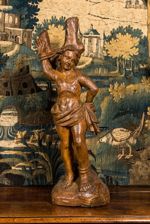 A wooden sculpture of Saint Sebastian with minor traces of polychromy, 16th C.