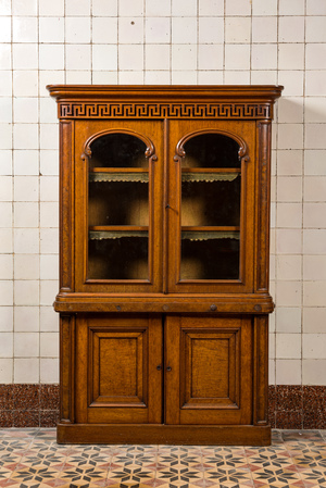 An oak display cabinet with meander decoration, ca. 1900