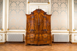 A Dutch mahogany veneered cabinet with two doors and three drawers, 18th C.