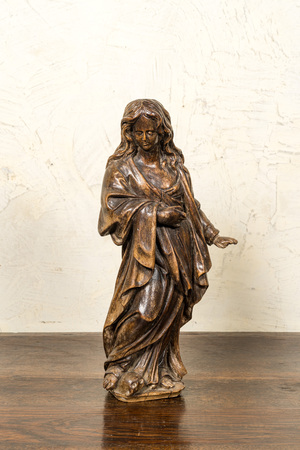 A walnut figure of Mary Magdalene, 17th C.
