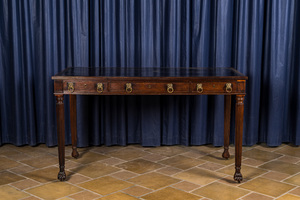 An English neoclassical mahogany writing desk with leather top, 19th C.