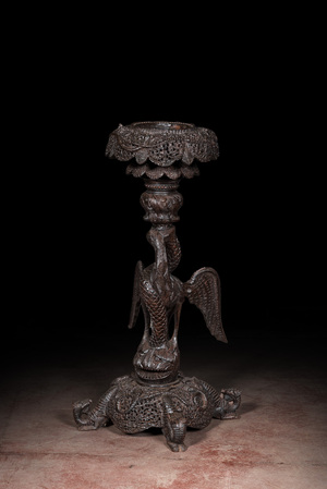 An Anglo-Indian colonial carved wood plant stand, 20th C.