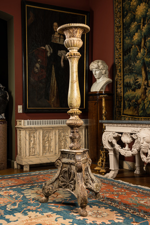 A massive Italian patinated wooden candlestick, 18/19th C.
