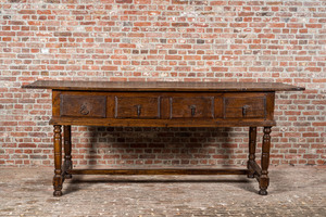 A four-drawer southern European walnut table, 18th C. and later