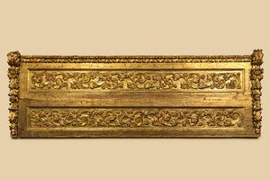 A large carved and gilt wooden panel with floral design, Italy, 17th C.
