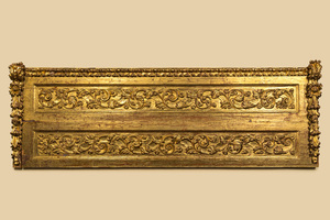 A large carved and gilt wooden panel with floral design, Italy, 17th C.