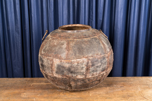 A spherical cauldron consisting of several iron plates, 19/20th C.