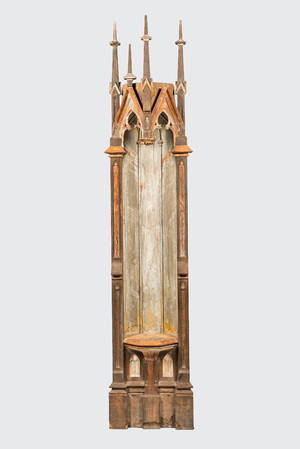 A patinated wooden Gothic Revival base with canopy, 19th C.