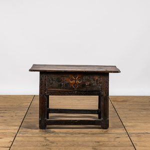 A Spanish wooden table with one drawer, 17/18th C.