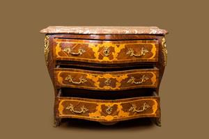 A French mahogany veneered commode à tombeau with floral marquetry, marble top and gilt bronze mounts, 18th C.