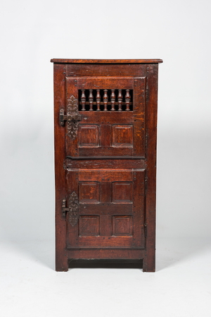 An oak wooden two-door pantry, 17th C. and later