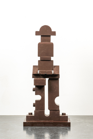 An abstract brown-painted wooden sculpture, 20th C.