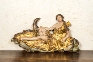 A polychromed and gilt wood carving depicting the goddess Diana and her dog, 17th C.