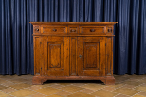 An Italian walnut sideboard with two doors and three drawers, 18th C.