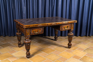 A tortoiseshell veneered and leather-topped wooden desk, 19/20th C.