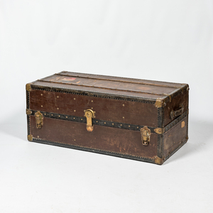 A large leather travel trunk with interior compartments, ca. 1900