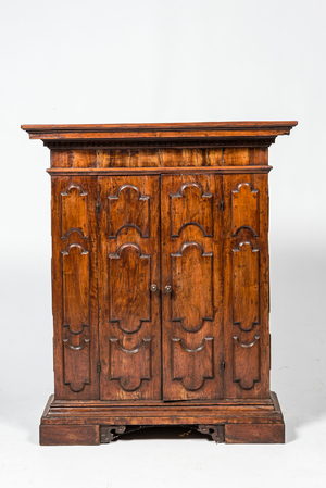 A two-door walnut cabinet, 18th C. and later