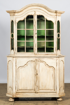 A patinated wooden display cabinet, 19th C.