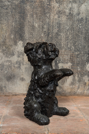 A patinated bronze model of a fox terrier dog, 20th C.
