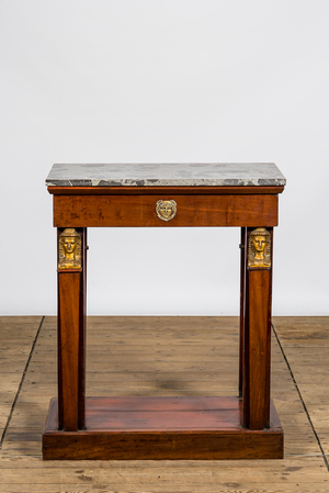 A French Empire-style mahogany console with marble top, 19th C.