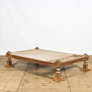 A presumably Indian wooden resting bed with traces of polychromy, 20th C.