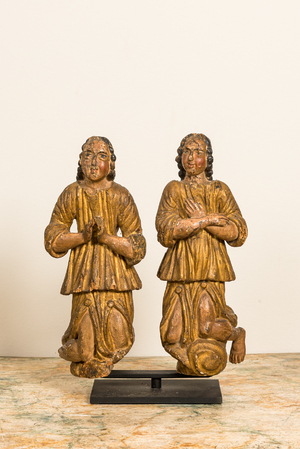 A pair of polychromed and gilt wooden figures of kneeling and praying angels, ca. 1700