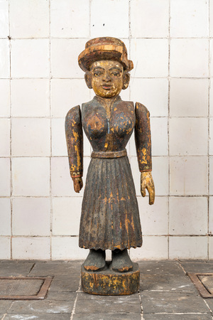 A polychrome wooden female figure, probably India, 19th C.