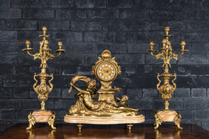 A three-piece gilt bronze clock garniture, France, 20th C.