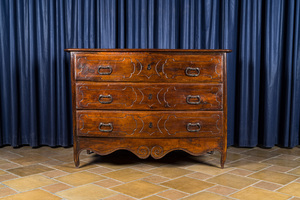 An Italian walnut chest of drawers, 18th C.