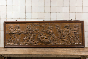 A large rectangular oak carving depicting 'The adoration of the shepherds', 18th C.