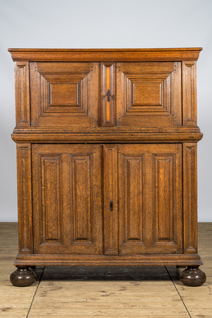 A simple oak four-door cupboard, 17th C.