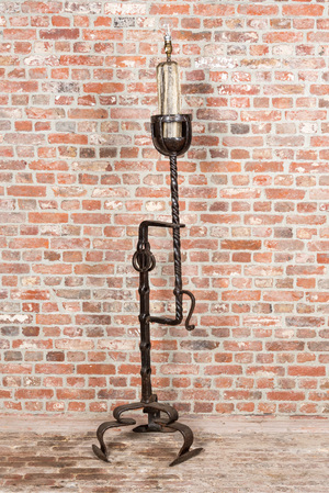 A large wrought iron candlestick transformed into a lamp, 19th C.