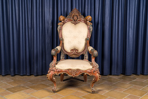 An Italian polychrome wooden armchair with busty winged cherubs, 18/19th C.