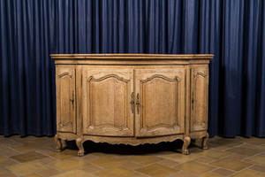 A French oak wooden four-door sideboard, 18/19th C.