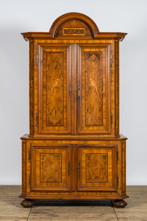 A German marquetry four-door 'deux-corps' cabinet with flowers and parrots, 18th C.