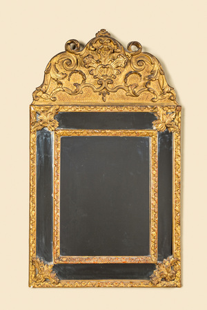 A French gilt wooden mirror, 18/19th C.