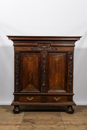 A rosewood two-door cupboard, 18/19th C.