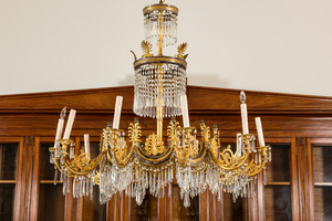 A German gilt metal, gilt wood and cut-glass ten-light chandelier after a design by Karl Friedrich Schinkel, ca. 1830