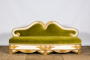 A neoclassical style gilt and patinated wooden sofa, 19th C.