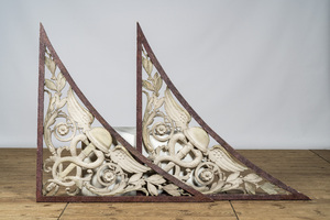 A pair of large faux porphyry and white patinated wooden corner ornaments with aesculapons, 19/20th C.