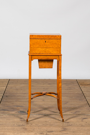 A fruitwood and burl wood veneered vanity set on foot, 20th C.