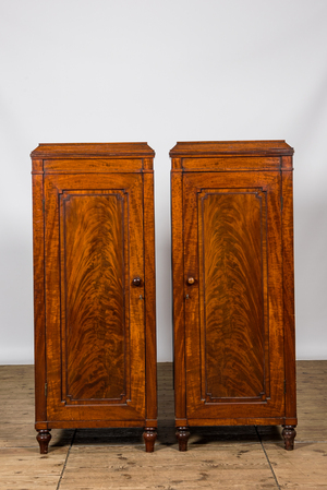 A pair of mahogany linen cupboards, ca. 1900