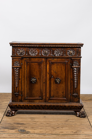 An Italian walnut two-door cabinet, 18th C.