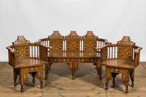 A North African salon set comprising a sofa and two armchairs with intarsia, 20th C.