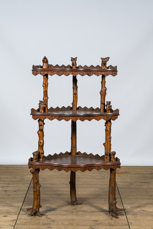 A naturalistic wooden corner rack with three shelves, 19/20th C.
