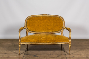 A French partly gilt and white patinated Louis XV-style sofa, 18/19th C.