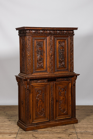 A richly carved walnut 'deux-corps' cabinet with Hermes and Aphrodite, 19th C.