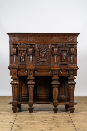 A walnut historicism cabinet on foot, 19th C.