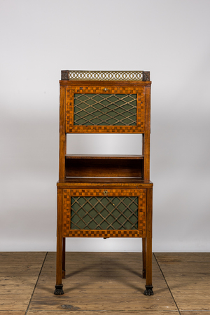 A bronze mounted mahogany cabinet with parquetry, 19th C.
