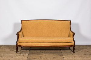 A French mahogany sofa, 19th C.